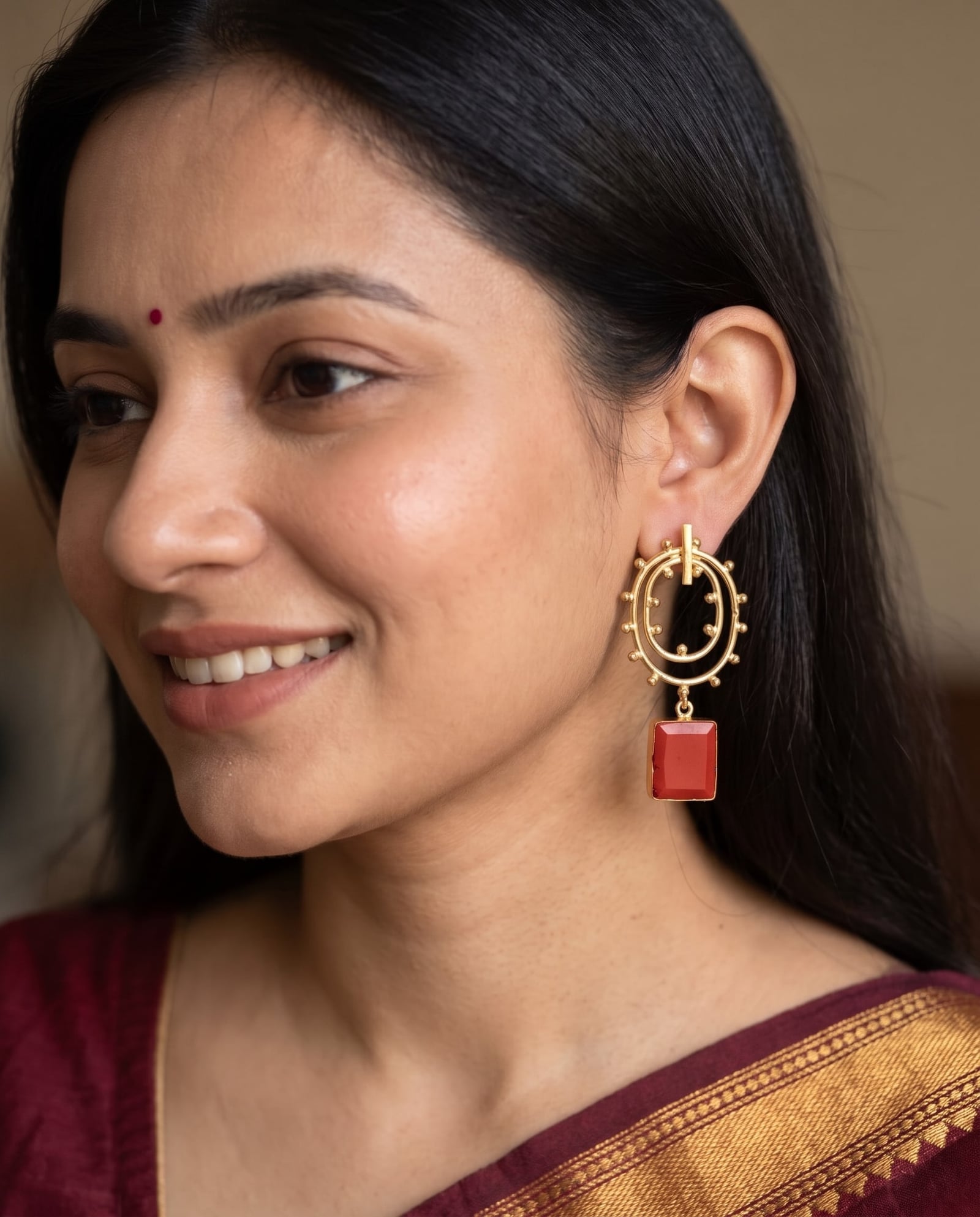 Gold Tone Red Stone Dangler Earrings